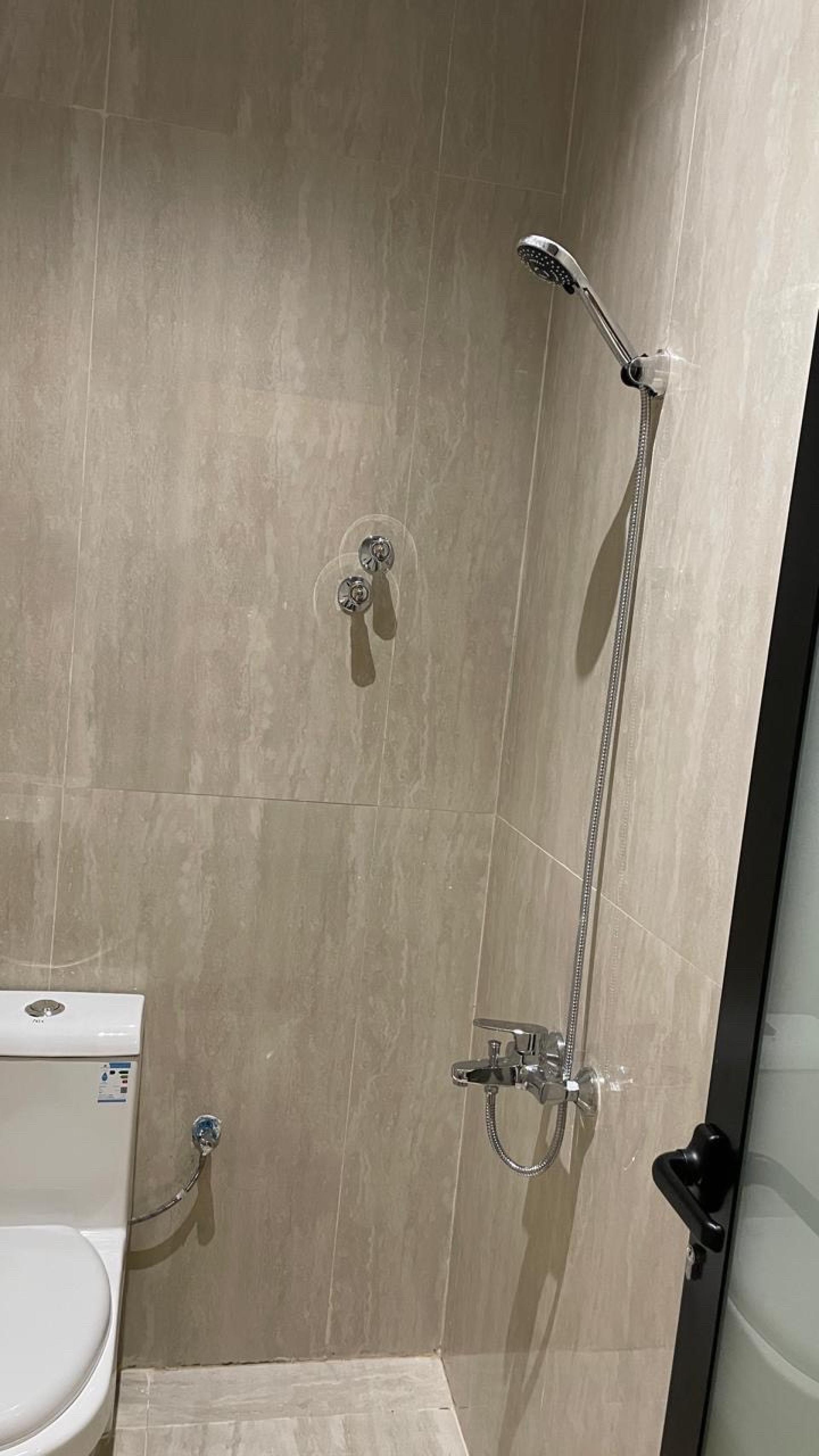 شقة بغرفة نوم وصالة دخول ذكي 9