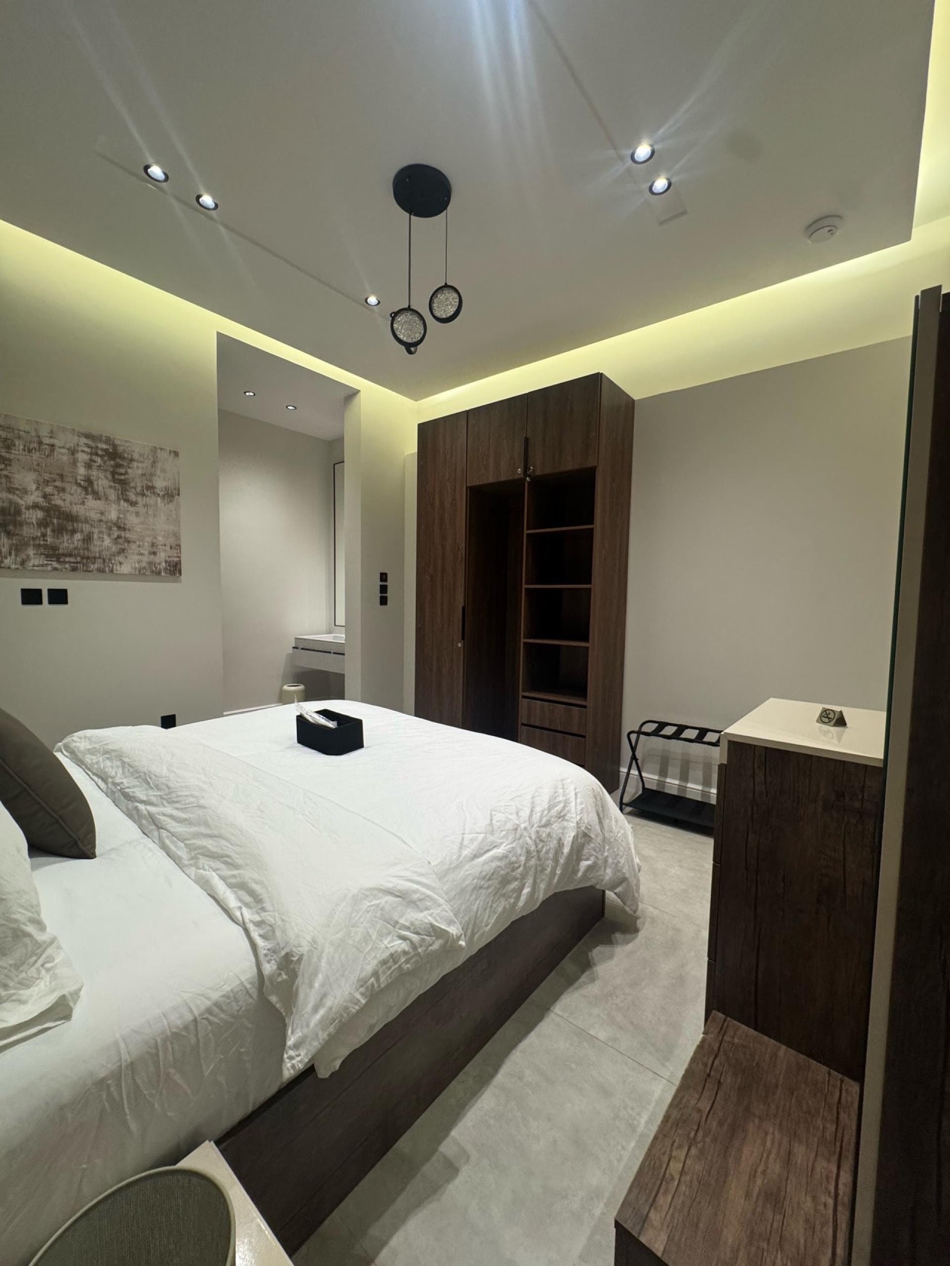 شقة فندقية بغرفة نوم وصالة دخول ذاتي 2