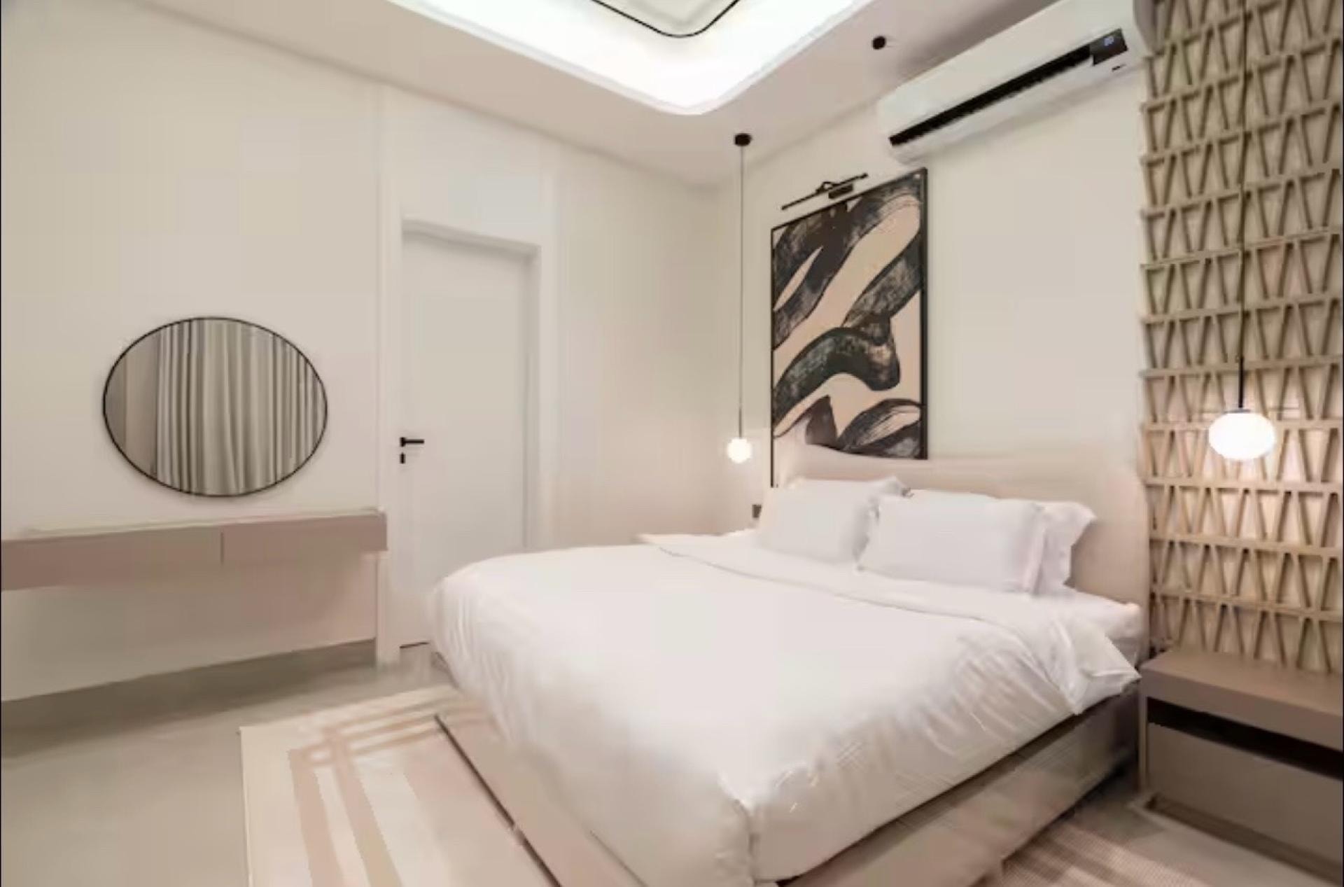 شقة فاخرة بغرفتين نوم وسينما منزلية 4